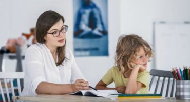 child not paying attention to teacher