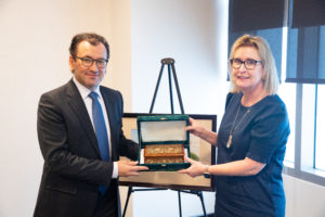 Ambassador Vakhabov gifts Dr. Susan Ballabina with jewelry box from Uzbekistan