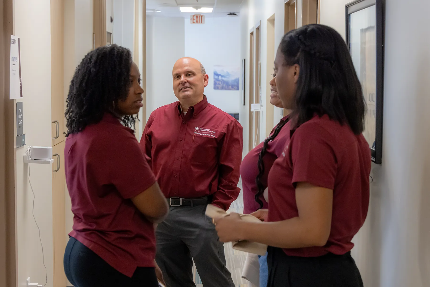 Dr. David Kahn with graduate students working at the CAC.