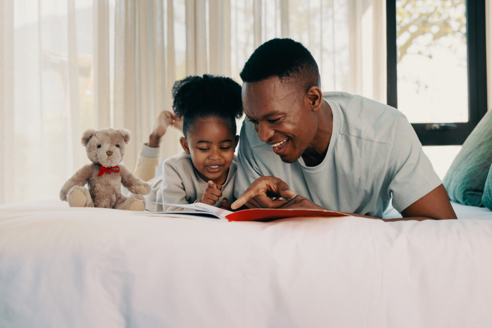 Father reading to child.