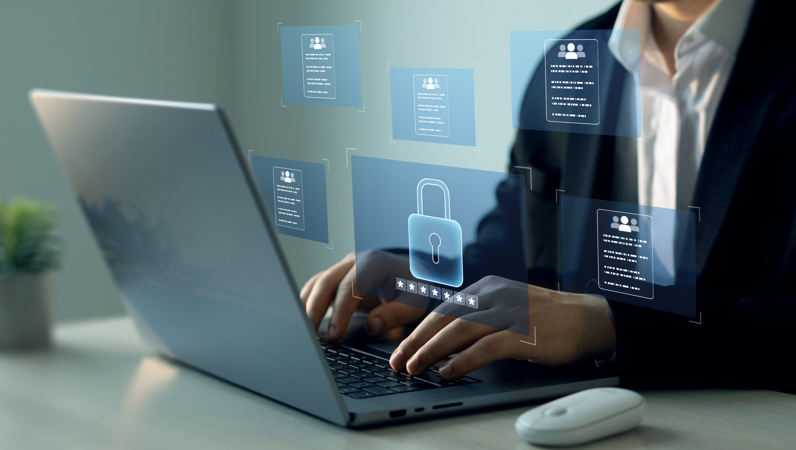 Person working on laptop with floating representations of digital security like locks and encrypted data.